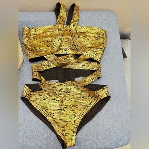 Gold accent swimsuit one piece